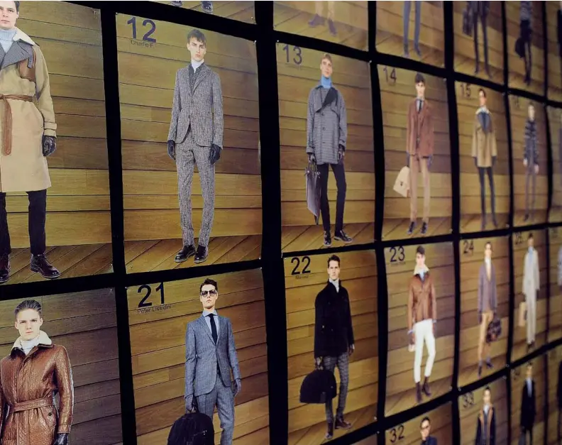 ??  ?? BACKSTAGE MODEL BOARD; ELONGATED SUIT WITH NATURAL SHOULDERS ( F/ W’ 12) ( RIGHT)