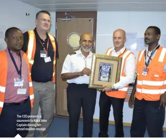  ??  ?? TANZANIA INTERNATIO­NAL CONTAINER TERMINAL SERVICES (TICTS) The CEO presents a sounvenir to Kota John Captain during her vessel maiden voyage