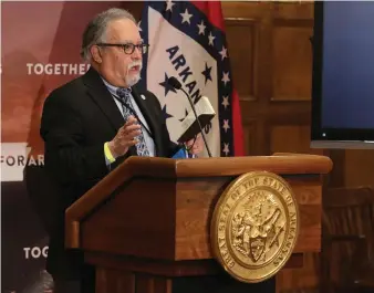  ??  ?? Secretary of Health Dr. Jose Romero talks about the vaccine rollout during the weekly COVID-19 press conference on Tuesday Dec. 29, at the state Capitol in Little Rock. (Arkansas Democrat-Gazette/Thomas Metthe)