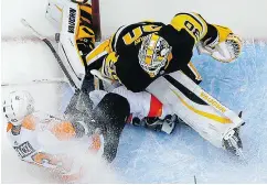  ?? GENE J. PUSKAR / THE ASSOCIATED PRESS ?? Matt Murray was placed on injured reserve Tuesday with a lower-body injury and is “week to week.” after colliding with the Philadelph­ia Flyers forward Jakub Voracek.