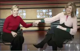  ?? MARY ALTAFFER- THE ASSOCIATED PRESS ?? Scarlett Johansson, left, and Arianna Huffington appear together on stage during the Women in the World Summit at Lincoln Center in New York, Thursday, April 6, 2017.