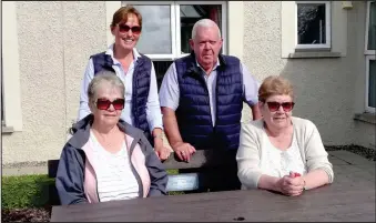  ?? ?? Evie Bowles’ family enjoying the garden furniture presented to Gortacharn Care Home in her memory of late Evie Bowles.