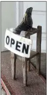  ?? Special to the Democrat-Gazette/ MARCIA SCHNEDLER ?? A single shoe outside the door indicates that Mississipp­i County Historical Center in downtown Osceola is open.