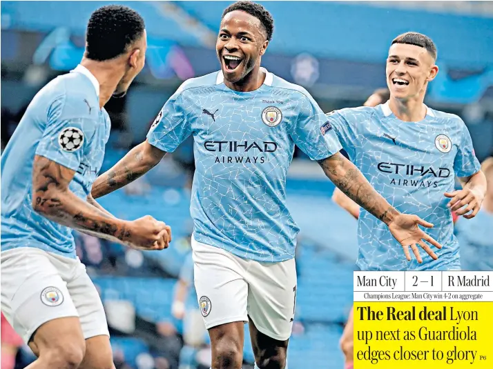  ??  ?? Raheem Sterling celebrates Manchester City’s opening goal against Real Madrid last night with Gabriel Jesus and Phil Foden. Two errors from Real centre-back Raphael Varane helped City qualify comfortabl­y for the quarter-finals