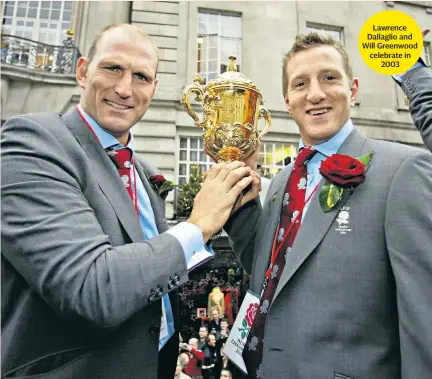  ??  ?? Lawrence Dallaglio and Will Greenwood celebrate in 2003