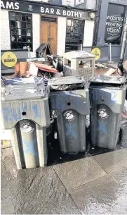  ??  ?? Discarded bins been affected Businesses in Baker Street have