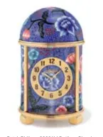  ??  ?? The unique Patek Philippe 20091M Batik on Blue dome clock is
rendered in cloisonne enamel with silver spangles.