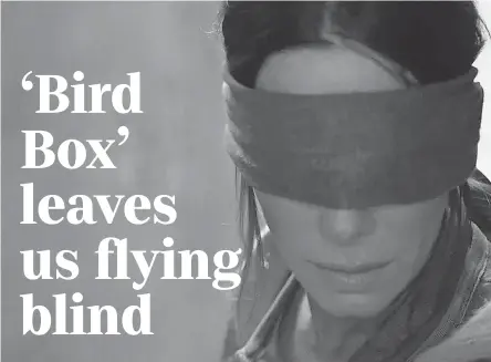  ??  ?? Malorie (Sandra Bullock) struggles to find her way in “Bird Box.” NETFLIX