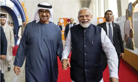  ?? Mohamed Al Hammadi / Presidenti­al Court ?? President Sheikh Mohamed at the Vibrant Gujarat Global Summit in western India with Indian Prime Minister Narendra Modi