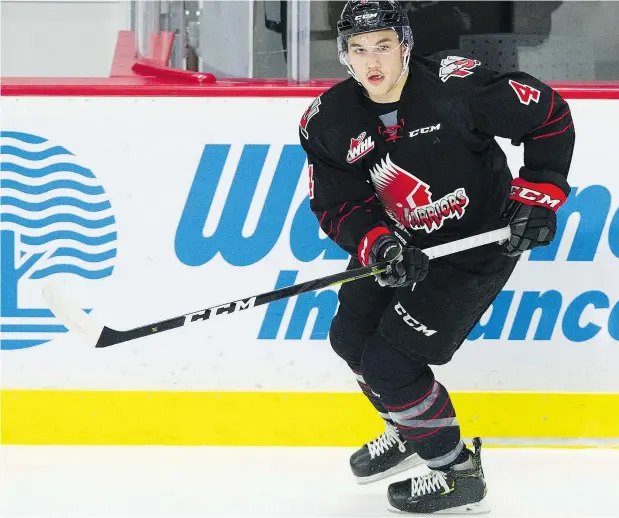  ?? GERRY KAHRMANN/PNG ?? Vancouver Canucks prospect Jett Woo of the Moose Jaw Warriors is known as a hard-nosed, stay-at-home defenceman but he has been trying to add to his game and now sits fourth among all blue-liners for points in the Western Hockey League this season.