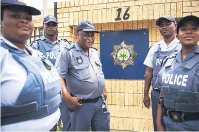 ?? Picture: Jacques Nelles ?? GAUTENG’S BEST. Captain George Mtsweni, centre, poses along with constables outside the Villieria Police Station, which scooped Gauteng’s Police Station of the Year award.