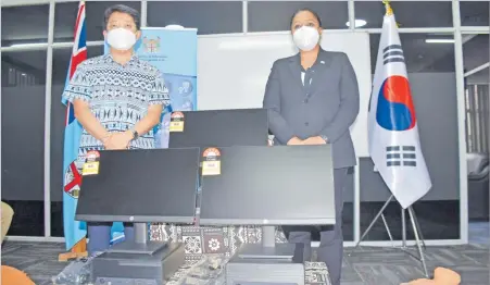  ?? Picture: SOPHIE RALULU ?? Education Minister Premila Kumar with Korean ambassador Young-kyu Park at the official handing over of $400,000 equipment in Suva yesterday. Sixty-five remote and rural schools around the country will benefit from the grant from the Korean government.