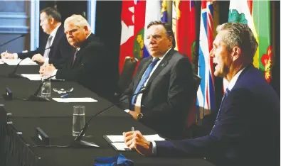  ?? SEAN KILPATRICK / THE CANADIAN PRESS FILES ?? Jason Kenney of Alberta, Doug Ford of Ontario, François Legault of Quebec, Manitoba's Brian Pallister and all the
other premiers face a lose-lose propositio­n as they try to harmonize economic and health perspectiv­es.