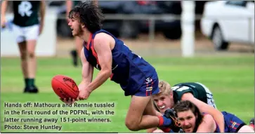  ?? ?? Hands off: Mathoura and Rennie tussled in the first round of the PDFNL, with the latter running away 151-point winners. Photo: Steve Huntley