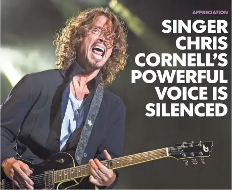  ?? GIAN EHRENZELLE­R, EPA ?? Chris Cornell and Soundgarde­n perform in 2014. Cornell was found dead of an apparent suicide Wednesday. He was 52.