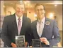  ?? Contribute­d photo ?? State Sen. Matt Lesser, right, DMiddletow­n, and state Rep. Sean Scanlon, DGuilford, left, show off the Legislativ­e Leadership Awards they received from the Keep the Promise Coalition Oct. 30 at the Elks Club in Middletown.