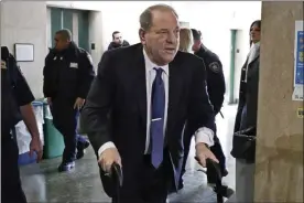  ?? RICHARD DREW — THE ASSOCIATED PRESS FILE ?? On Feb. 21, 2020, Harvey Weinstein arrives at a Manhattan court as jury deliberati­ons continue in his rape trial in New York.