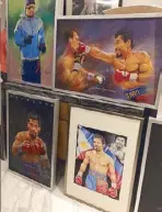  ??  ?? Pacquiao paintings by artist Jun Aquino were sold at the post-fight party.