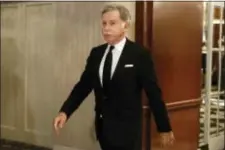  ?? RICHARD DREW — ASSOCIATED PRESS FILE ?? In this file photo, St. Louis Rams owner Stan Kroenke walks in the hallway during a break of National Football League owners meeting, in New York. Monday is the first day for teams to apply for relocation and Kroenke wants to move the franchise to Los...