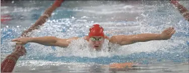  ?? BILL UHRICH — READING EAGLE ?? Wilson’s Isaiah Eberly wins the 100butterf­ly in a pool-record time of 50.99against Gov. Mifflin Tuesday at Shillingto­n.