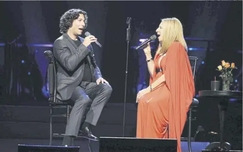  ?? COURTESY BARWOOD FILMS ?? Jason Gould performing with his mother Barbra Streisand