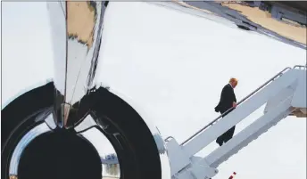  ?? AP PHOTO ?? President Donald Trump boards Air Force One in Andrews Air Force Base, Md., for a trip to the G7 Summit in Charlevoix, Que.