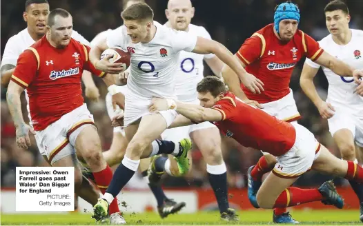  ?? PICTURE: Getty Images ?? Impressive: Owen Farrell goes past Wales’ Dan Biggar for England