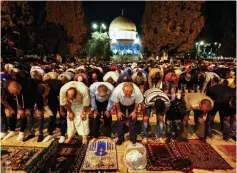  ?? (Sliman Khader/Flash90) ?? WORSHIPERS PERFORM Taraweeh prayers at al-Aksa Mosque in Jerusalem’s Old City earlier this week.