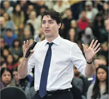  ?? ED KAISER/ POSTMEDIA NEWS ?? Prime Minister Justin Trudeau answers questions at his cross country town hall meeting at MacEwan University in Edmonton last week.