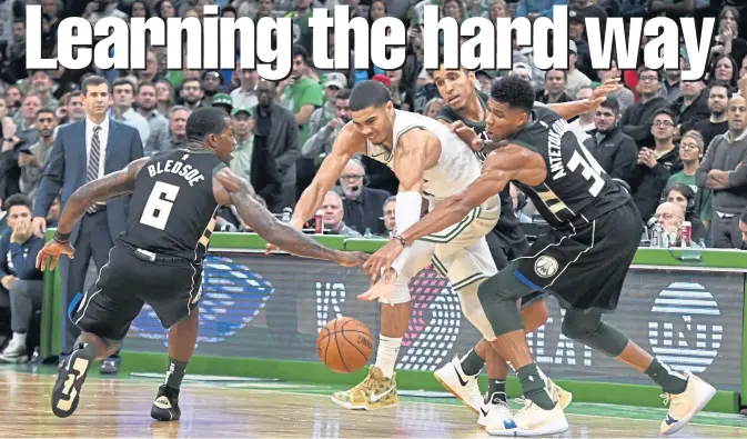  ?? CHRISTOPHE­R EVANS / BOSTON HERALD ?? TIME TO ADJUST: Jayson Tatum, like his friend Donovan Mitchell, had a big adjustment to make when Gordon Hayward wasn’t in the picture for their teams last season.