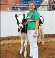  ?? SUBMITTED PHOTO ?? Ellissa Kunkel from Kempton, who is a member of the Northern Berks 4-H Club, competed in type classes for dairy and dairy showmanshi­p at the 2018 PA Farm Show.