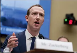  ?? THE ASSOCIATED PRESS ?? Facebook CEO Mark Zuckerberg decided to exempt politician­s’ ads from Facebook’s factchecki­ng program. Democratic presidenti­al candidate Elizabeth Warren is running a false ad on Facebook that says Zuckerberg has endorsed President Donald Trump. He hasn’t.