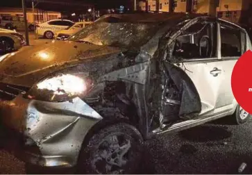  ??  ?? KEADAAN kereta yang dinaiki Zahidah bersama dua anak saudaranya yang terbabit dalam nahas di Kilometer 7, Jalan Maharajale­la.