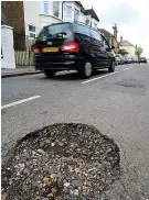  ?? Picture: PA ?? Nuisance...potholes plague roads