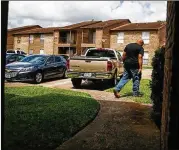  ?? MICHAEL CIAGLO / HOUSTON CHRONICLE ?? Reggie Rossow Jr. walks out into his apartment complex in Clute in June. Rossow lost his spleen to an accidental shooting, and was saddled with $50,000 in medical bills.