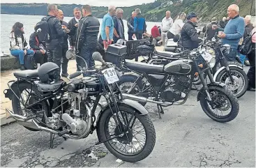  ?? ?? The VMCC Manx Rally at Laxey with a wide variety of machinery – even a modern Herald has sneaked in there.