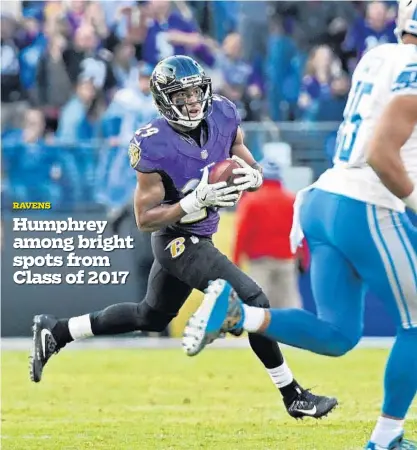  ?? KENNETH K. LAM/BALTIMORE SUN ?? Marlon Humphrey, returning an intercepti­on against the Lions, stepped into a starting cornerback role for the Ravens after Jimmy Smith was lost for the season with an Achilles tendon injury Nov. 5. He performed well in covering some of the NFL’s elite receivers.