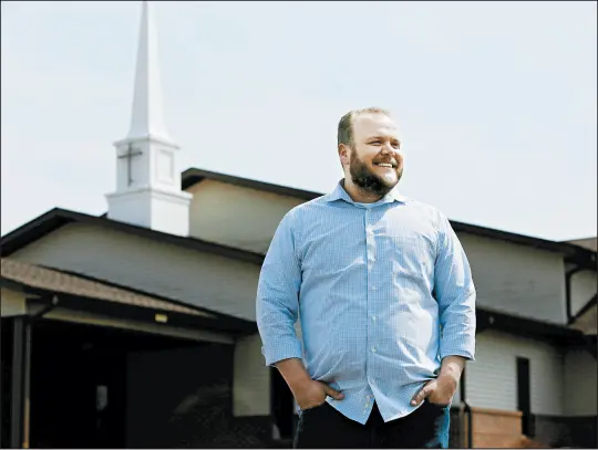  ??  ?? SUZANNE TENNANT/POST-TRIBUNE The Rev. Danny Cox stands outside of LifeWell: A Christian Church in Crown Point. The church opened in October. Members will hold their first Easter service at the church April 21.