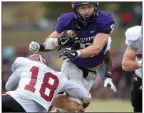  ?? Arkansas Democrat-Gazette/THOMAS METTHE ?? Ouachita Baptist’s Drew Harris (2) tries to shake off Henderson State defensive back Malcom Scott (18) during the third quarter of OBU’s 49-42 victory Saturday at Cliff Harris Stadium in Arkadelphi­a. Harris had 216 yards and scored 7 touchdowns.