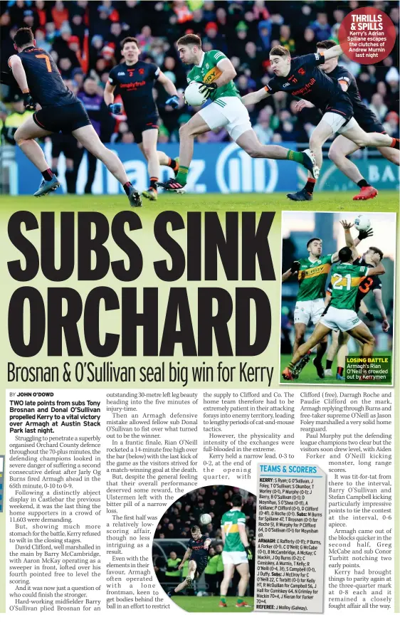  ?? ?? THRILLS & SPILLS Kerry’s Adrian Spillane escapes the clutches of Andrew Murnin last night
LOSING BATTLE Armagh’s Rian O’Neill is crowded out by Kerrymen