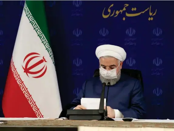  ?? (EPA) ?? Hassan Rouhani wears a mask yesterday during a meeting of Iran’s National Task Force for Fighting Coronaviru­s