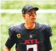  ?? AP PHOTO/DANNY KARNIK ?? Atlanta Falcons quarterbac­k Matt Ryan leaves the field after Sunday’s loss to the Chicago Bears in Atlanta.