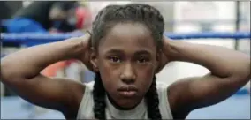  ?? OSCILLOSCO­PE VIA AP ?? This image released by Oscillosco­pe shows Royalty Hightower in a scene from “The Fits,” a film about an 11-year-old girl who learns about gender and identity through dance.