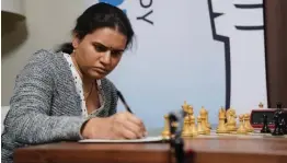  ??  ?? India’s Koneru Humpy makes note during her game at the Cairns Cup in USA.