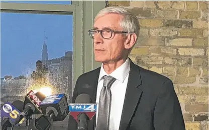  ?? MEG JONES/MILWAUKEE JOURNAL-SENTINEL VIA AP ?? Gov.-elect Tony Evers says “Wisconsin should be embarrasse­d” by bills weakening the governor.