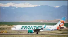  ?? Associated Press ?? A Frontier Airlines jetliner taxis to a runway for take off from Denver Internatio­nal Airport on May 26.