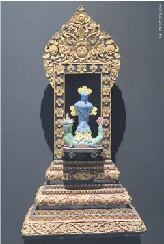  ?? ?? Garuda And Naga Deity with an antique wooden frame.