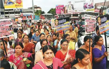  ?? PTI ?? Members of the Hindu community, mostly women, take part in a protest at Kaloor in Kerala’s Ernakulam district, against the Supreme Court verdict in the Sabarimala Temple case.