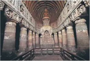  ??  ?? This chaitya griha or prayer hall (above) can be traced to the fifth century AD. The hall has painted depictions of Buddha in various poses.