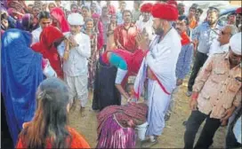  ?? HIMANSHU VYAS/HT PHOTO ?? BJP MLA Otaram Devasi, heading the country’s only ministry for the welfare of cows, campaigns to seek a third term from his assembly constituen­cy of Sirohi on Thursday.